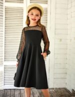 Suggest a better title and return a single title only without any other comments: Arshiner Girl's Contrast Mesh Puff Long Sleeve High Waist A Line Short Dress with Pockets for 6-13 Years - Image 4