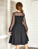 Suggest a better title and return a single title only without any other comments: Arshiner Girl's Contrast Mesh Puff Long Sleeve High Waist A Line Short Dress with Pockets for 6-13 Years - Image 3