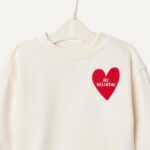 Suggest a better title and return a single title only without any other comments: Amazon Essentials x Sofia Grainge Toddlers and Baby Girls' French Terry Pant and Top Set - Image 5