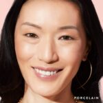 Suggest a better title and return a single title only without any other comments: LAURA GELLER NEW YORK Baked Balance-N-Glow Illuminating Foundation - Porcelain - Buildable Sheer to Light Coverage - Satin Finish - Image 4