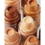 Suggest a better title and return a single title only without any other comments: Neutrogena Healthy Skin Liquid Makeup Foundation,Broad Spectrum SPF 20 Sunscreen,Lightweight & Flawless Coverage Foundation with Antioxidant Vitamin E & Feverfew,Natural Beige,1 fl. oz (Pack of 1) - Image 6