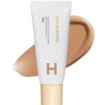 Suggest a better title and return a single title only without any other comments: Hourglass Veil Hydrating Skin Tint, Dewy Tinted Moisturizer, Makeup and Skincare Benefits, Lightweight, Buildable Coverage, Vegan, Cruelty-Free Hourglass Skin Tint for Radiant, Natural Glow
