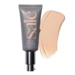 Suggest a better title and return a single title only without any other comments: Saie Slip Tint Tinted Moisturizer with SPF 35 - Light Coverage, Glowy Skin Tint & Mineral Sunscreen for Face with Hydrating Hyaluronic Acid - Summer Makeup Essential - Shade Three (1.35 oz)