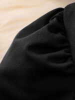 Suggest a better title and return a single title only without any other comments: OYOANGLE Girl's Formal Wear 2 Piece Outfits Button Ruffle Hem Puff Sleeve Blazer and Flare Pants Suit Set - Image 3