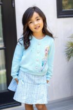 Suggest a better title and return a single title only without any other comments: Disney Frozen Elsa Stitch Princess Moana Minnie Toddler Girl 2 Piece Outfit Kid Pearl Button Knit Top & Tweed Skirt Set 2-13Y - Image 6